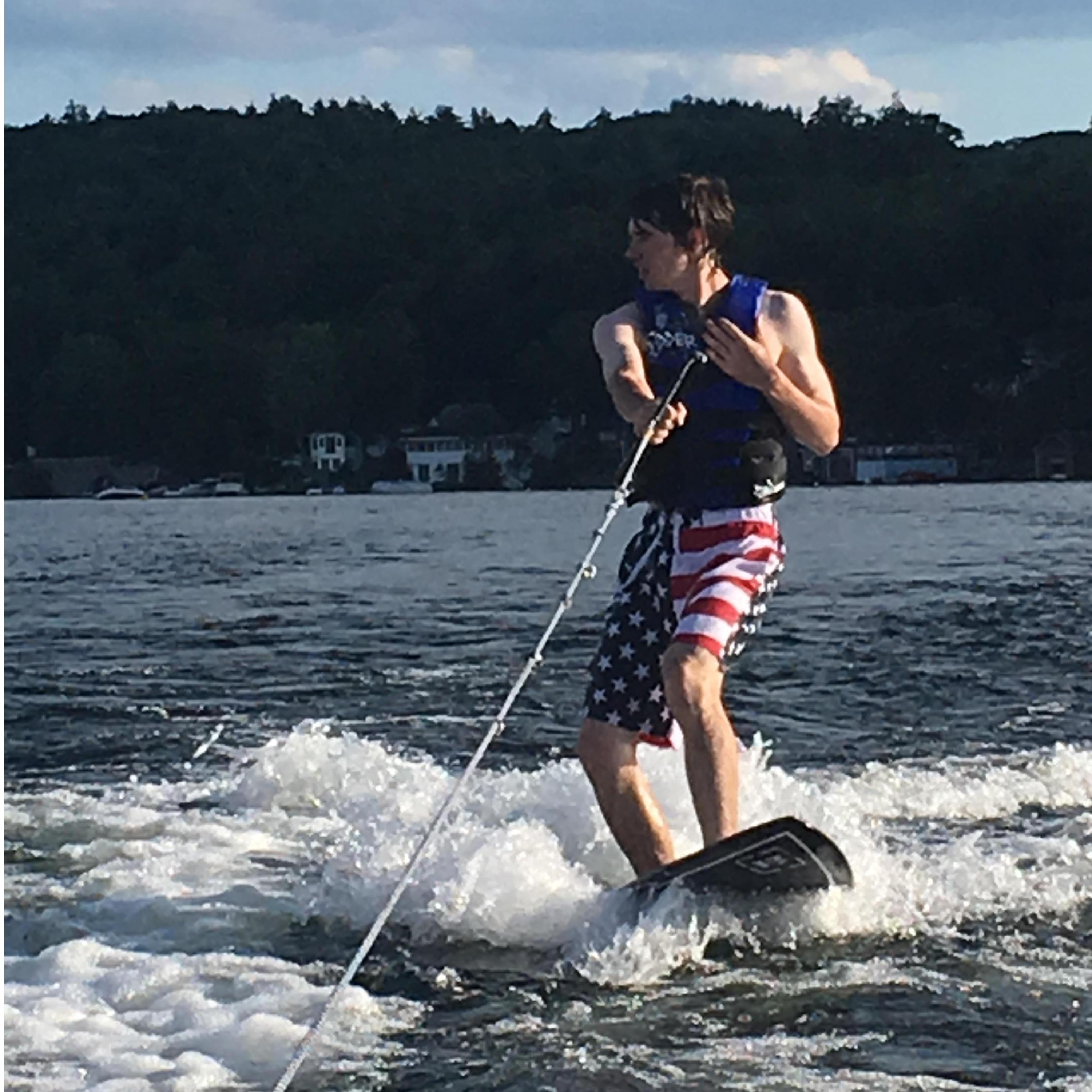 Brian wake boarding on Lake Winnipesaukee.