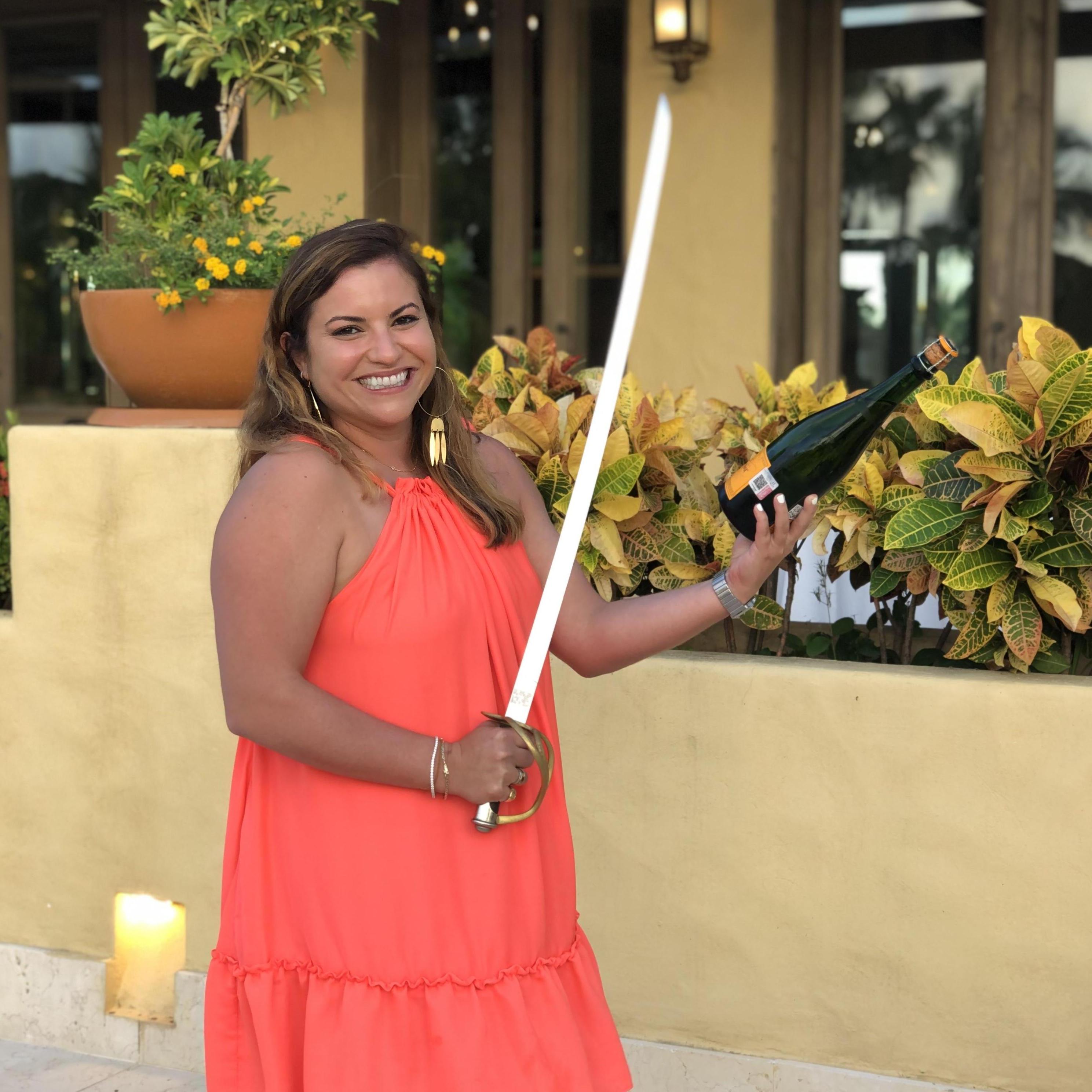 Olivia is a master swordswoman and expert champagne saberer! Cheers!