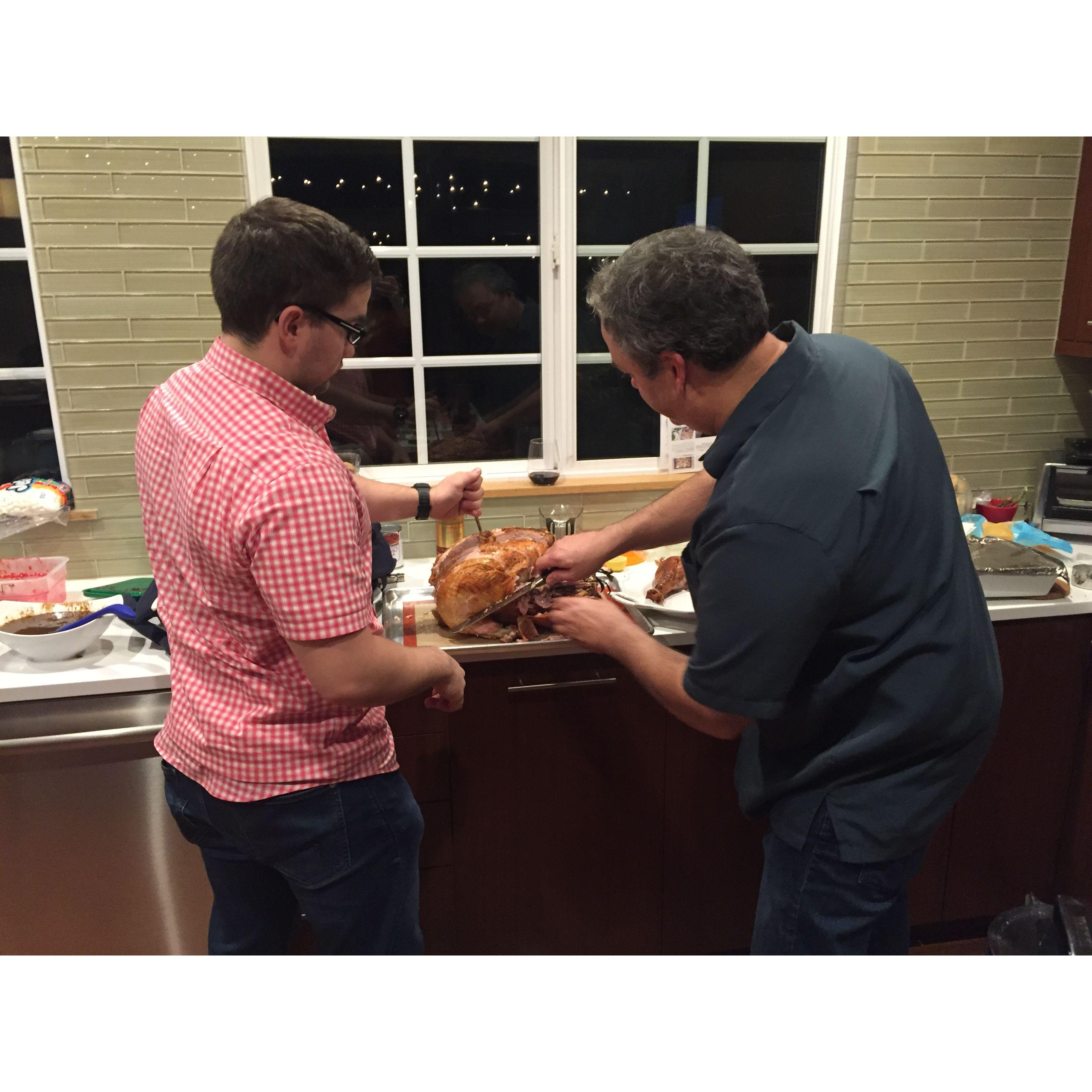 Kaleb & Tessa's dad, Brad carving the Thanksgiving Turkey together in 2017.