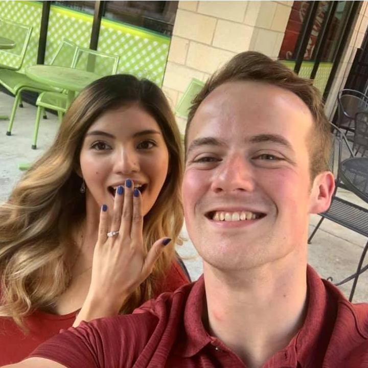 Me showing off my ring after Luke proposed.