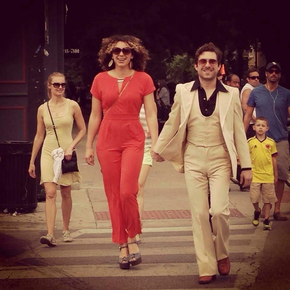 The couple was spotted crossing a street on their way to a bbq and street fest.  Photographer Ana Hoban credited with this; the best picture of the couple ever taken.