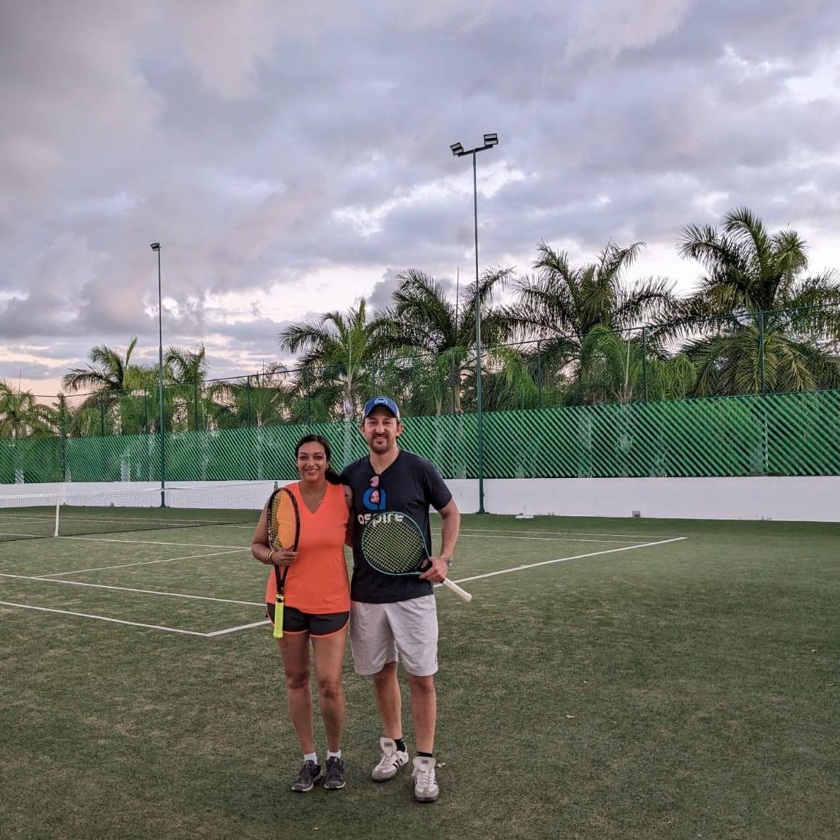 Doing one of the things we most love doing together! This was the rooftop grass court in Mexico