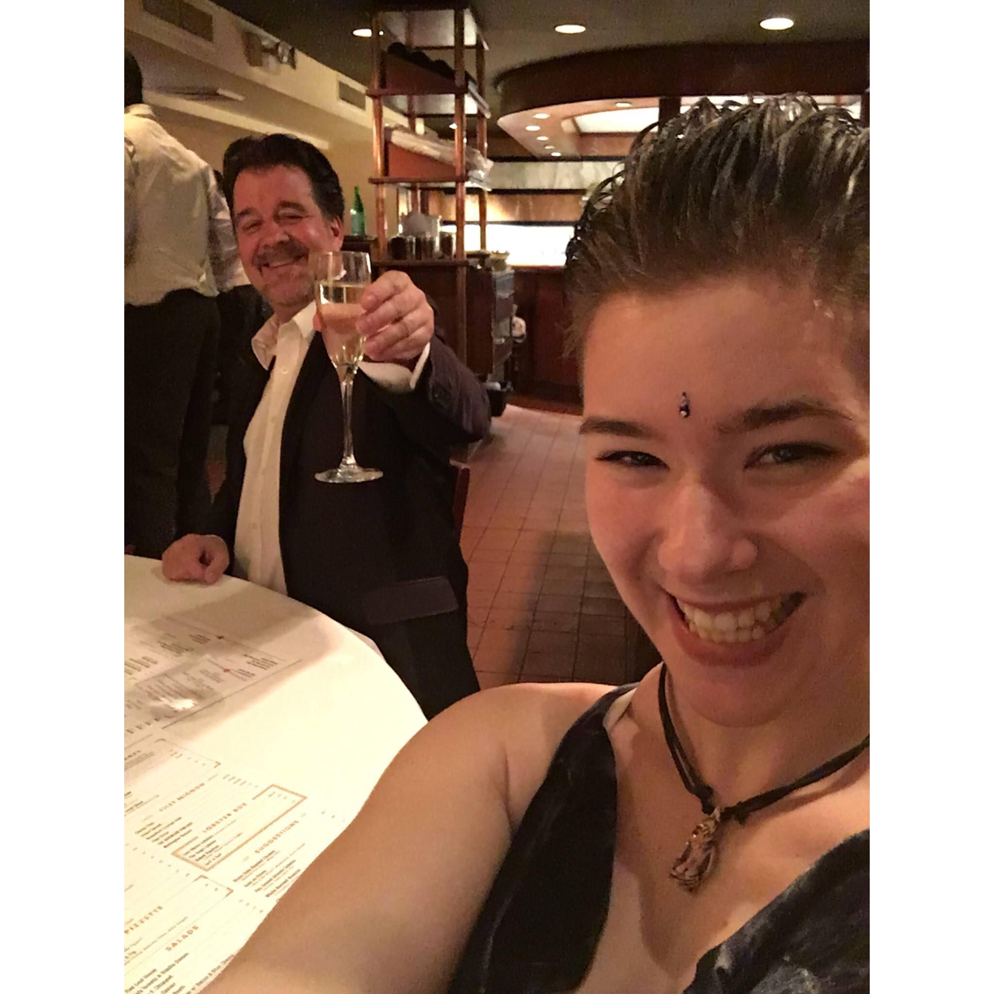 Isabella toasting with her father