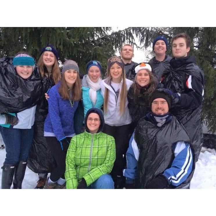 We first met in fall 2014 through our campus involvement. Here we are with some mutual friends after spending the afternoon sledding. (Pro Tip: If you don't have a sled, use a trash bag instead!)
