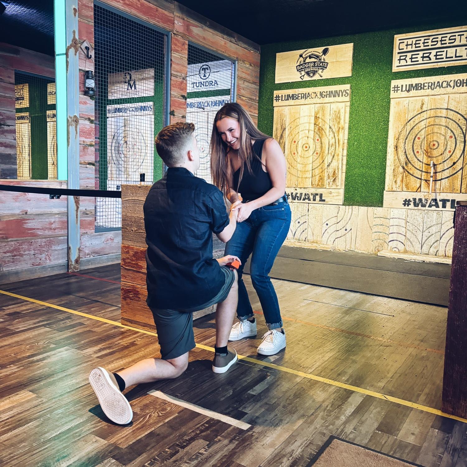 Our Engagement at Lumberjack Johnny's Axe Throwing, where we had our second date 364 days prior!