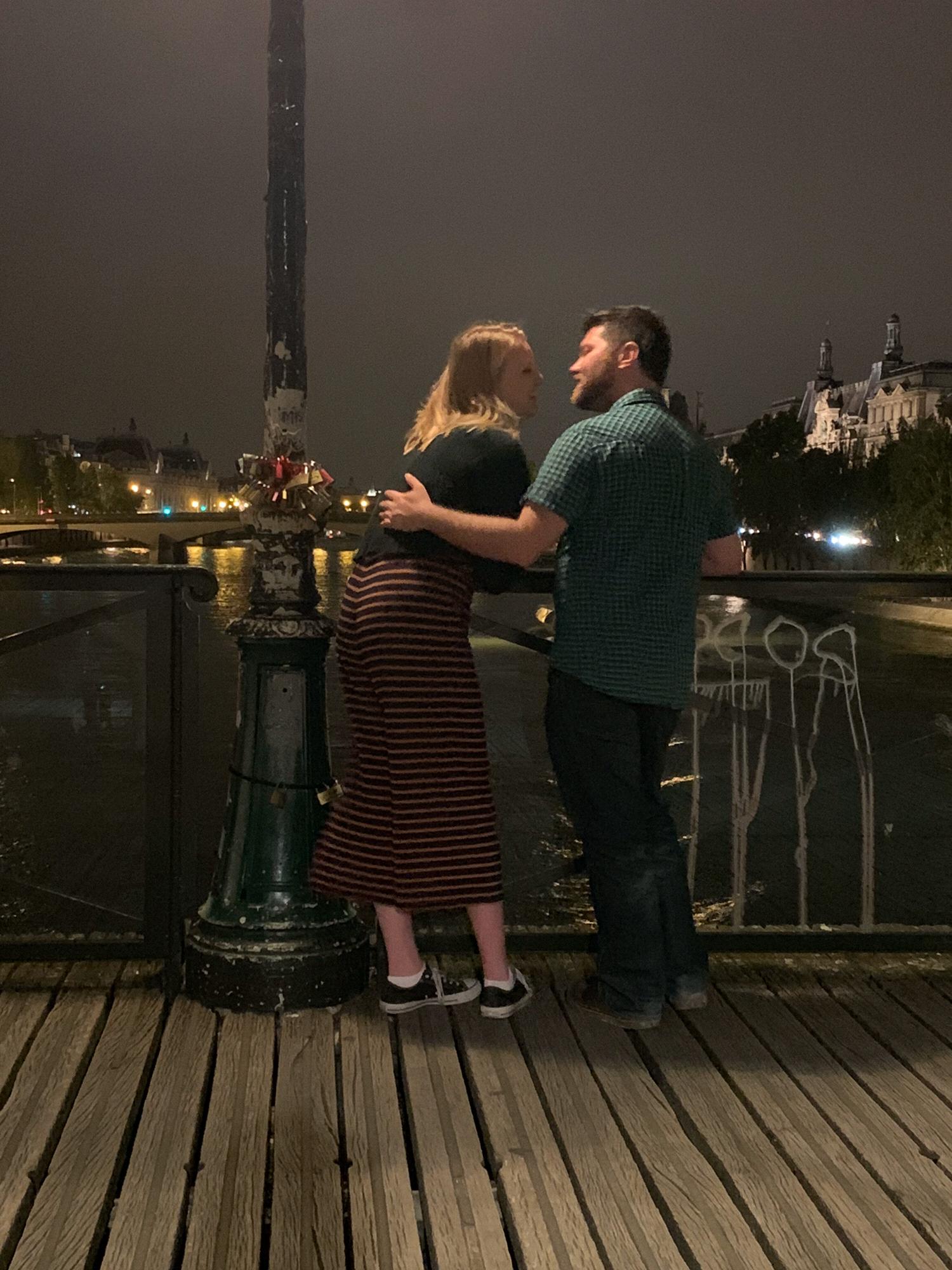 Throwing our love lock key off of the love lock bridge