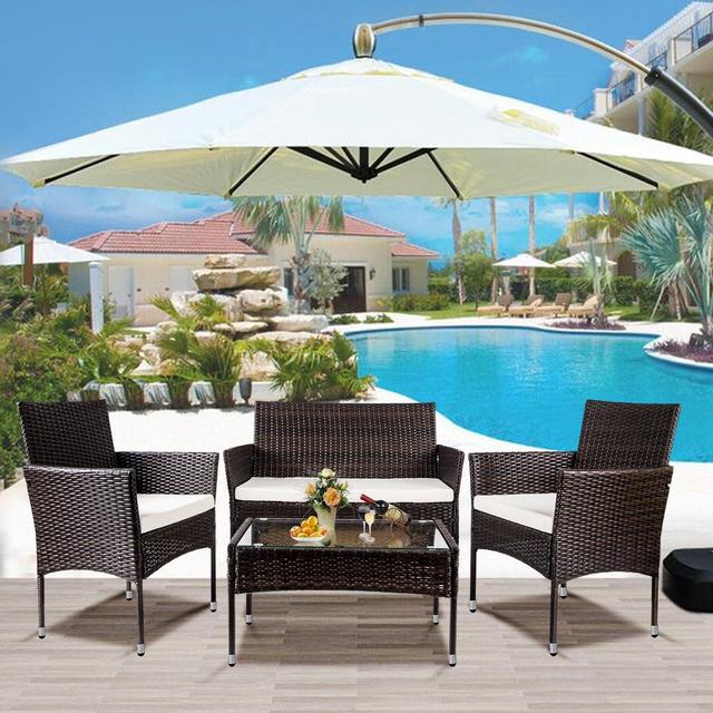 Boomer 4 Piece Rattan Sofa Seating Group with Cushions