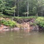 Relax by the river on our property