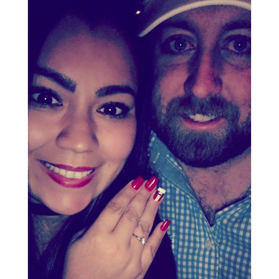 The moment after Andrew got down on one knee and Claudia said "I Do."
