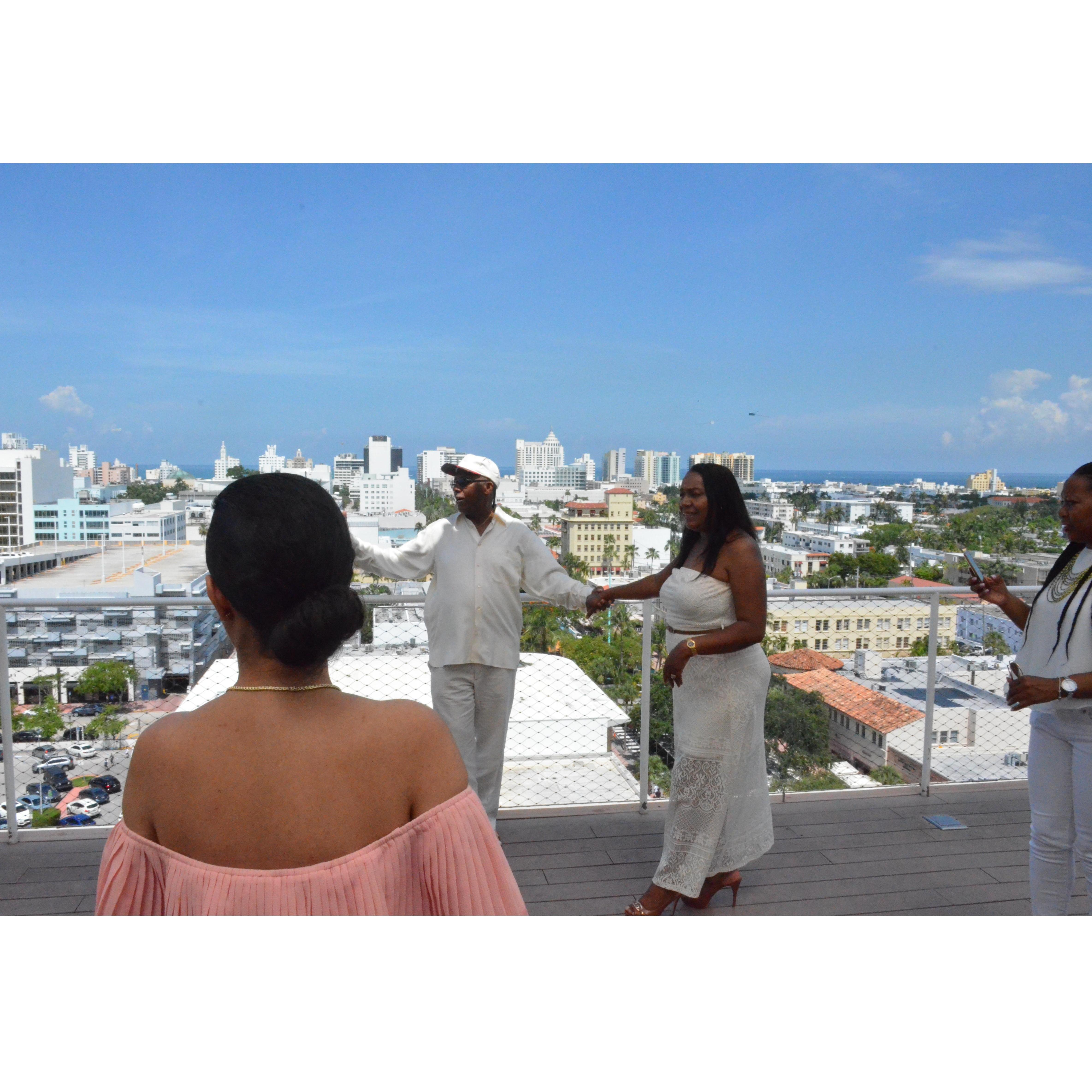 Everyone's ready to take pictures on the rooftop!