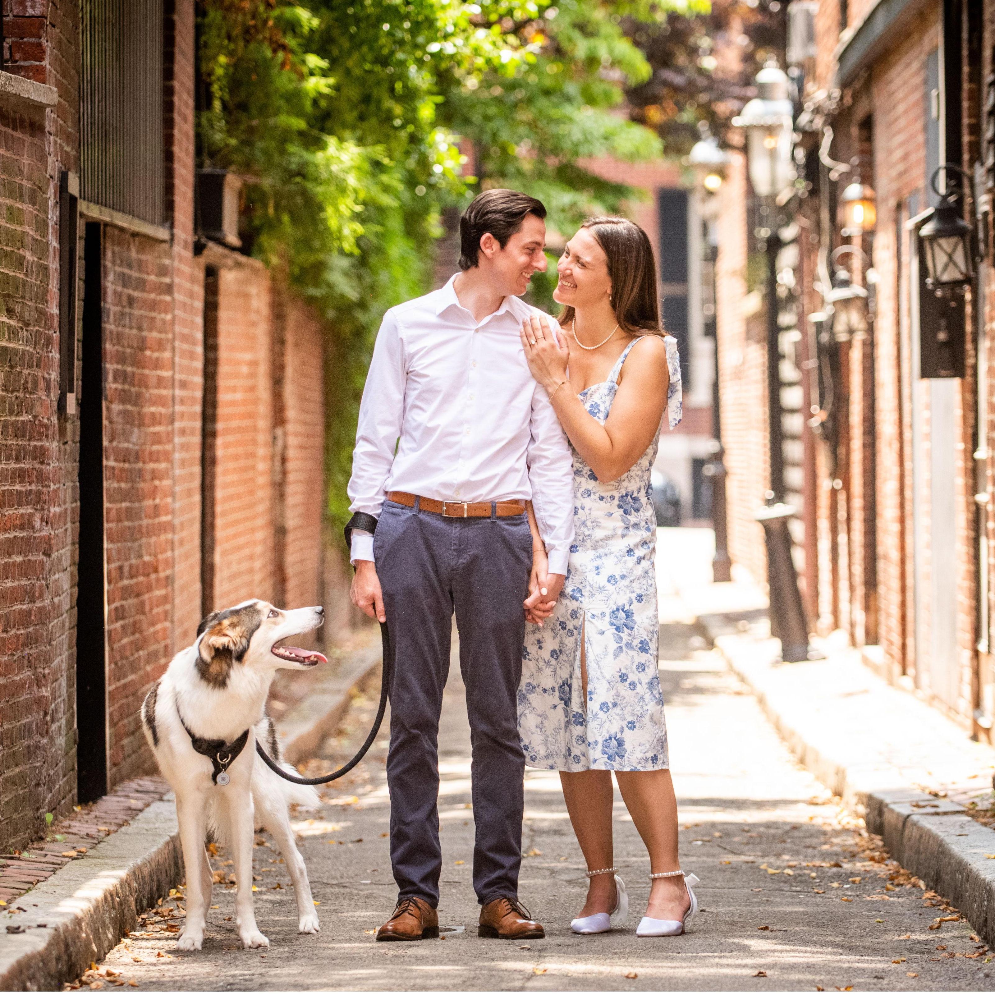 JULY 2024 Emily and Justin took engagement photos in Beacon Hill and, of course, Cappy had to be included. This is their favorite family photo!