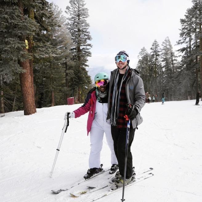 Patience is an advanced skier skiing with a beginner. True love