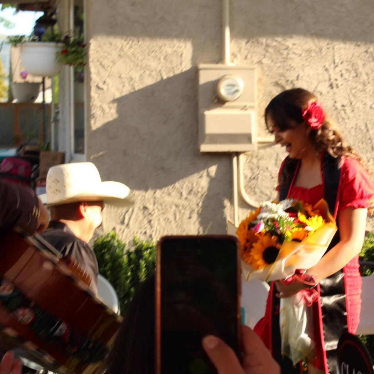 Here Jimmy surprised Daniela at her grad party when he popped the question!