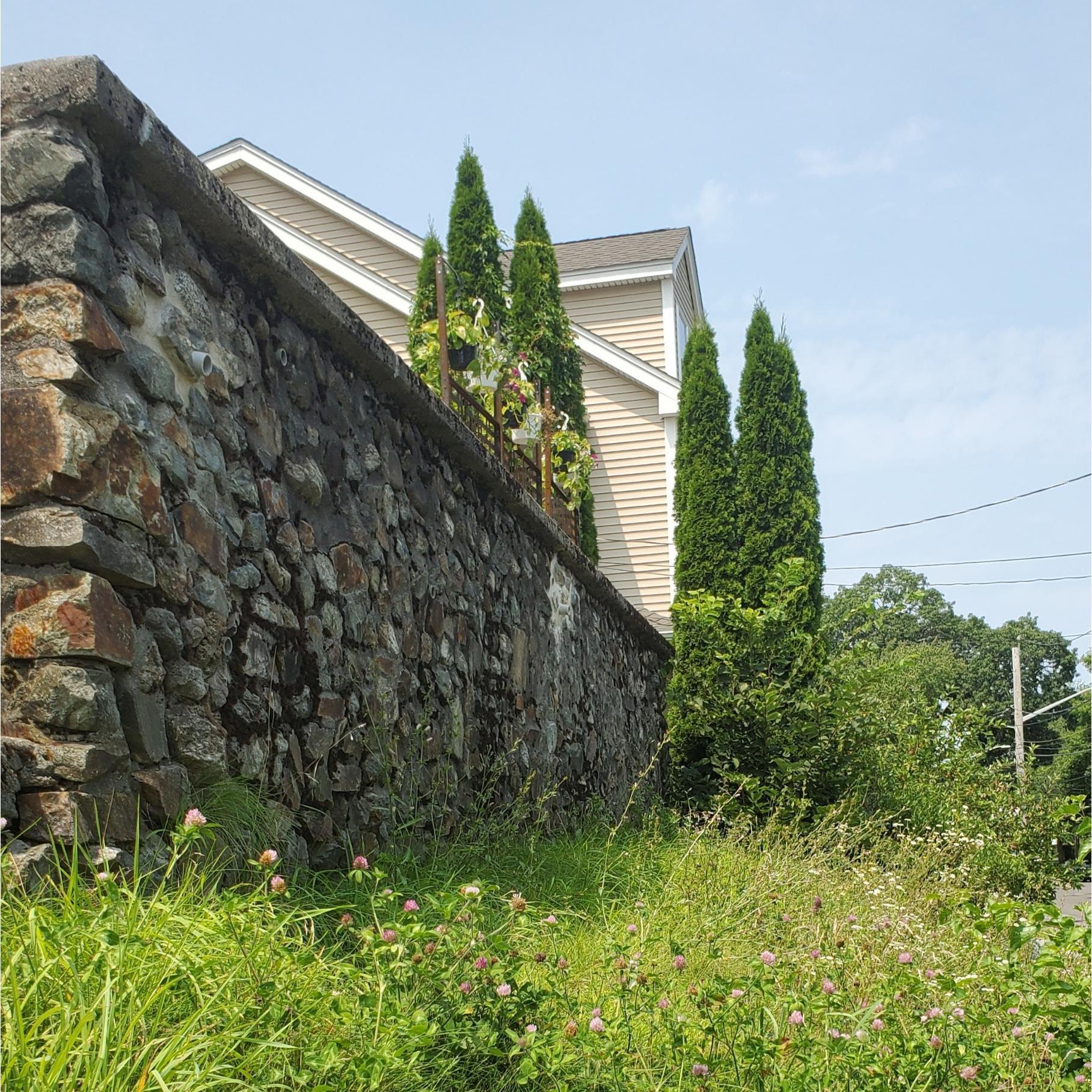 View from below the patio. Soon to be converted to native prairie. (Also a good spot for a gargoyle head or two)