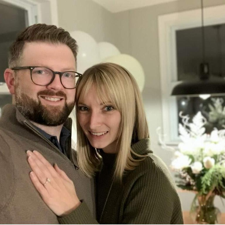 We're engaged! Shaun proposed in the kitchen of the house that we flipped together.