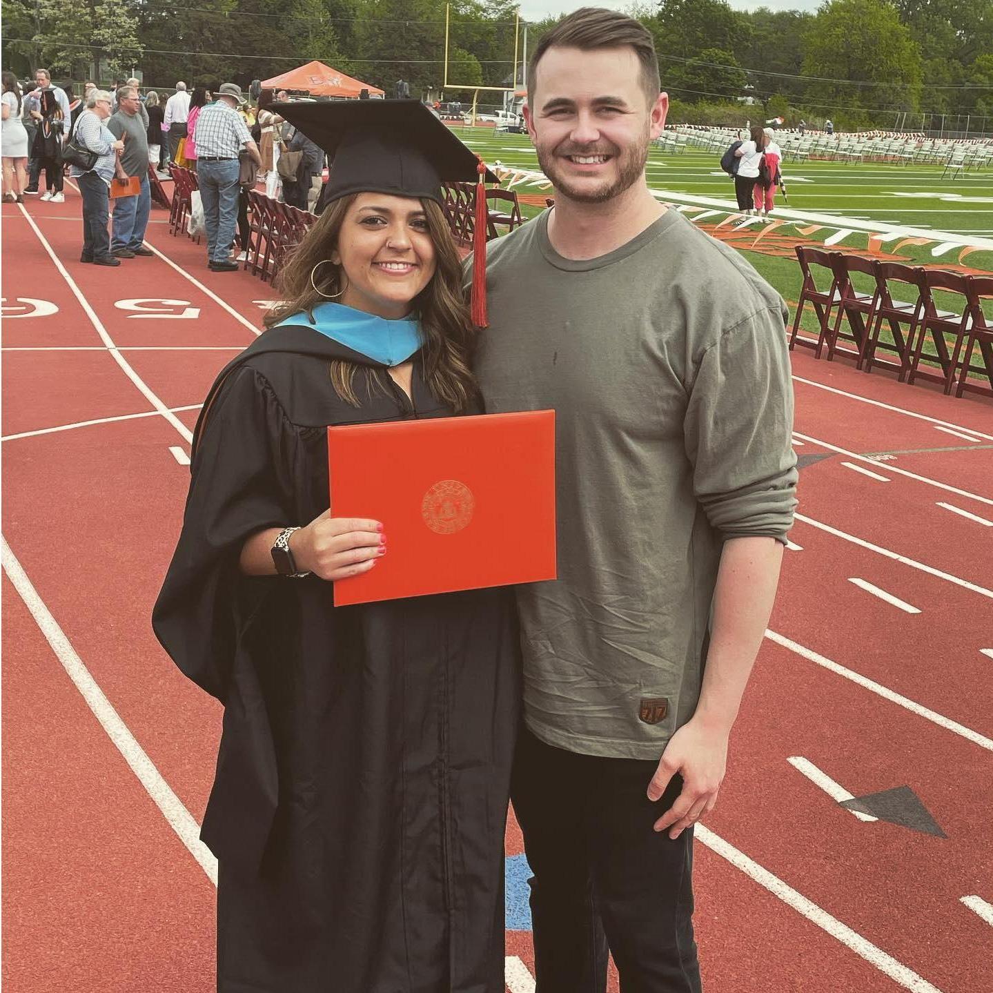 Syd graduates with her masters. Konner and Bentley support her through this journey.