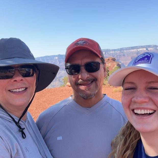Madi hiking the Cedar Ridge trail of the Grand Canyon with her Aunt Joni and Uncle Chaz.