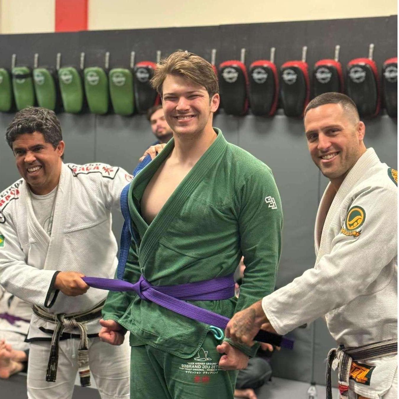 Jeremy being awarded his purple belt in Brazilian Jiu Jitsu, 2024.