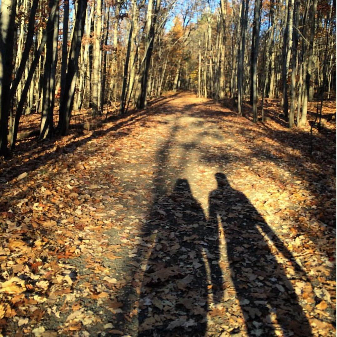Me dragging Alex on a walk on a pretty fall day.