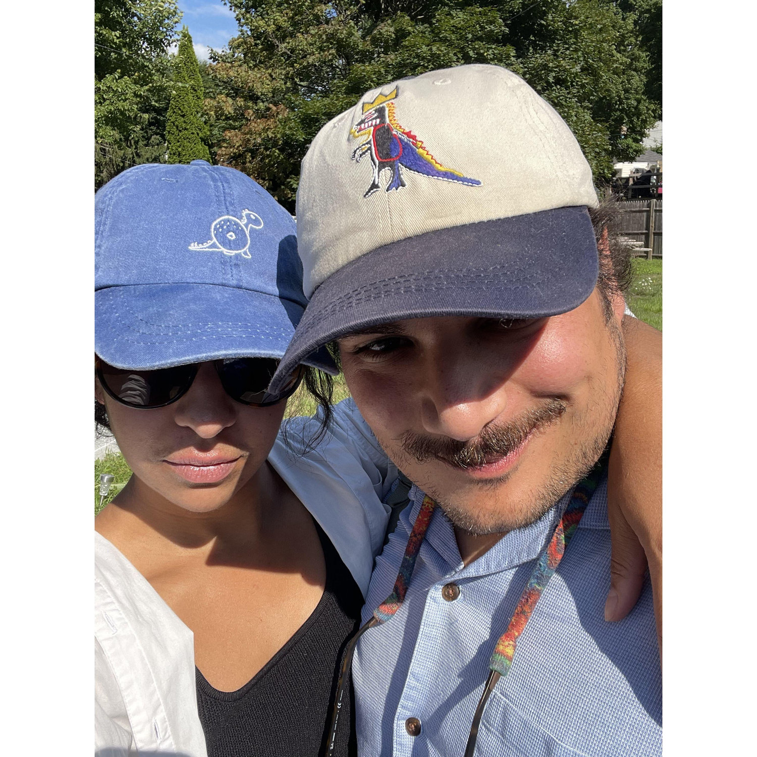 Matching dino hats in our backyard in Kittery, ME - July 2024