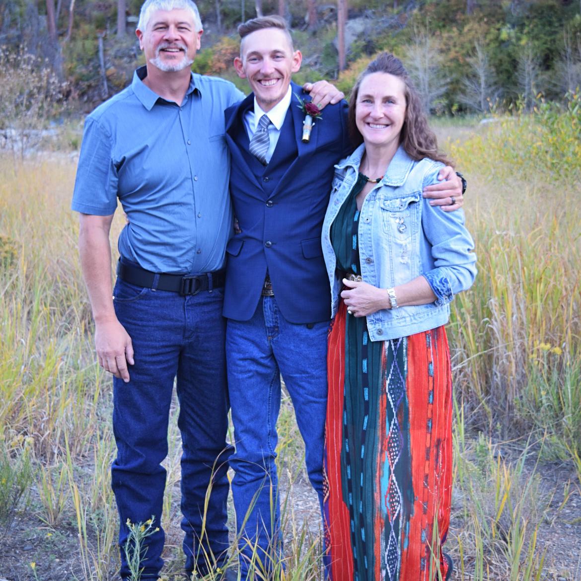Denley with his parents
