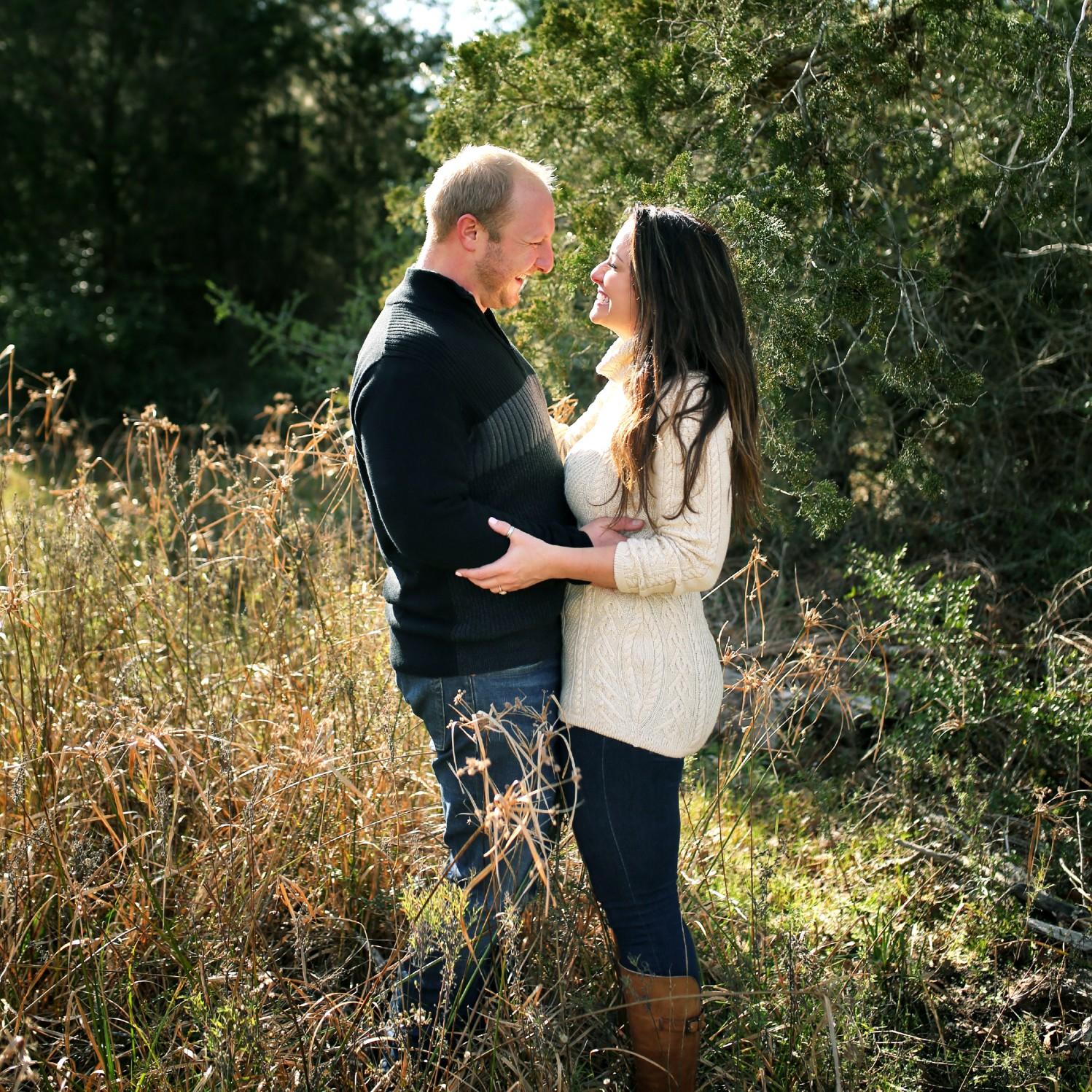 You know us...always just standing in fields and smiling at each other!! 
(Engagement photos are so funny. Haha)