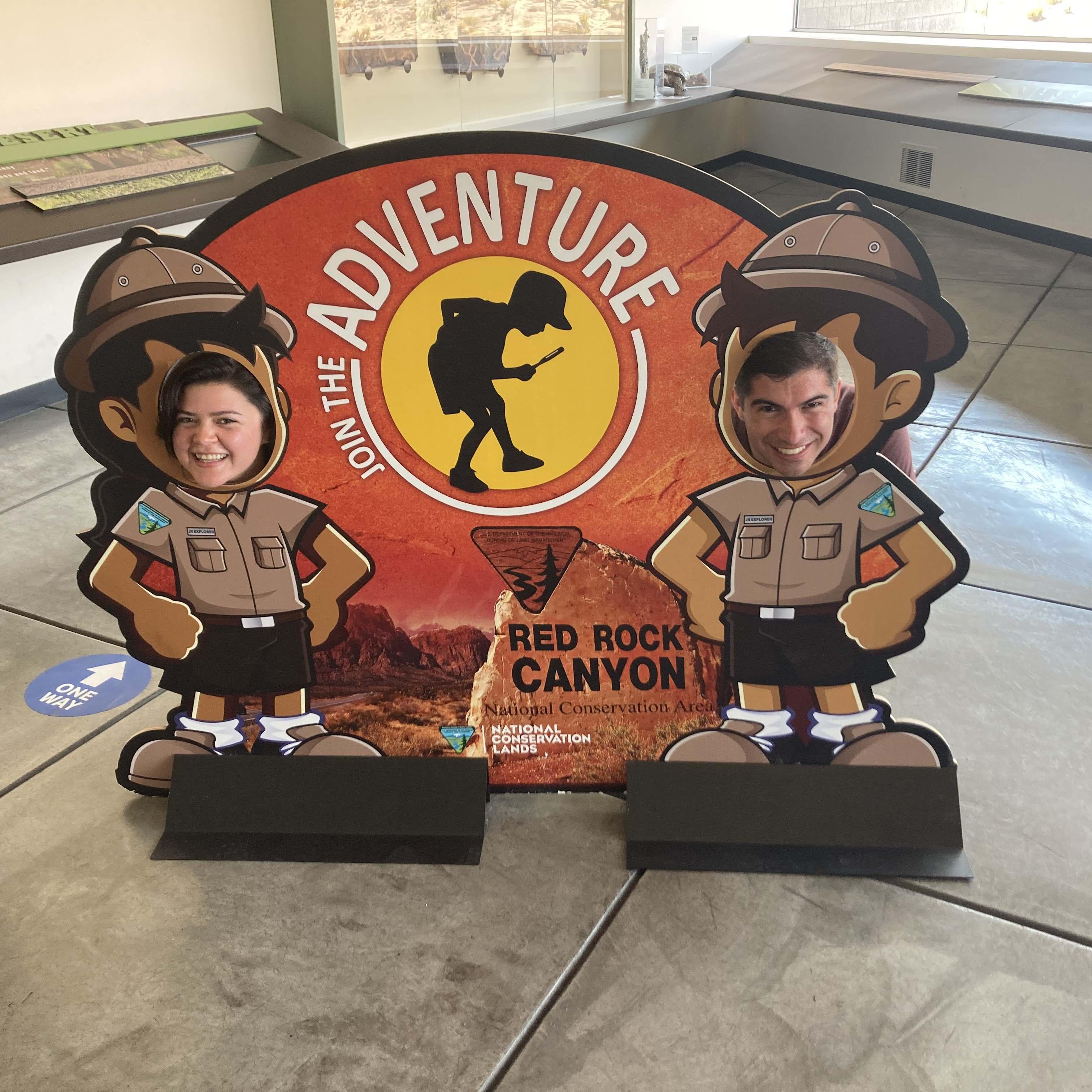 We did not get a photo of the park sign BUT we did crouch down for this sign inside the park's visitor center. The gentlman who took this photo thought we were a "cute couple" :)