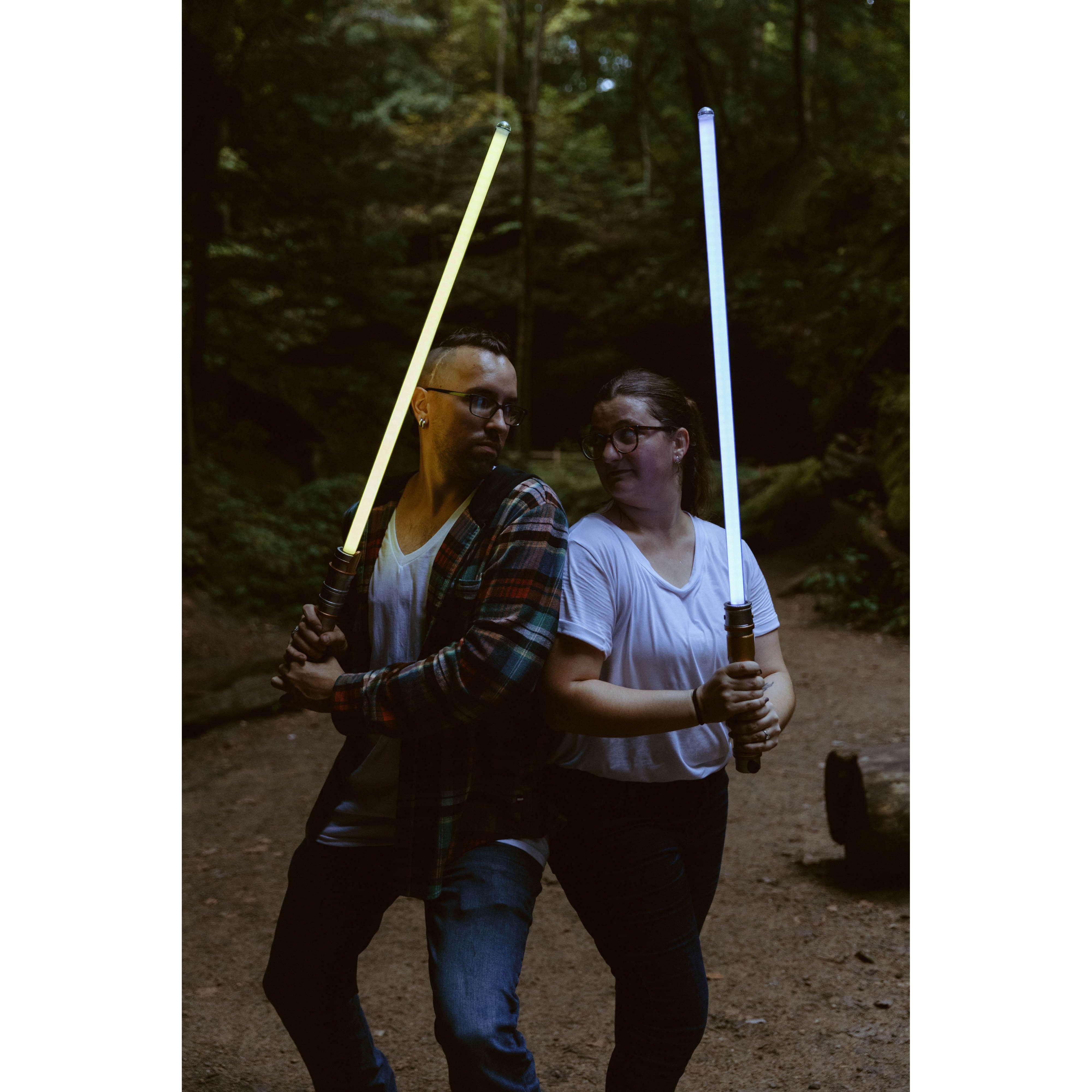 We are so glad our photographer allowed us to use our lightsabers in our shoot!