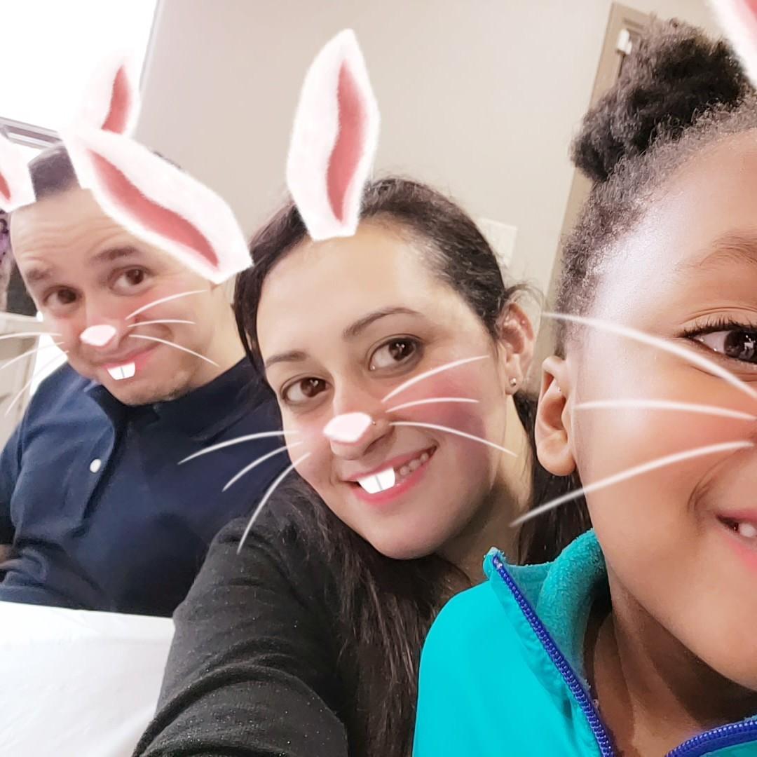 Of course using technology and silliness to entertain the little one.