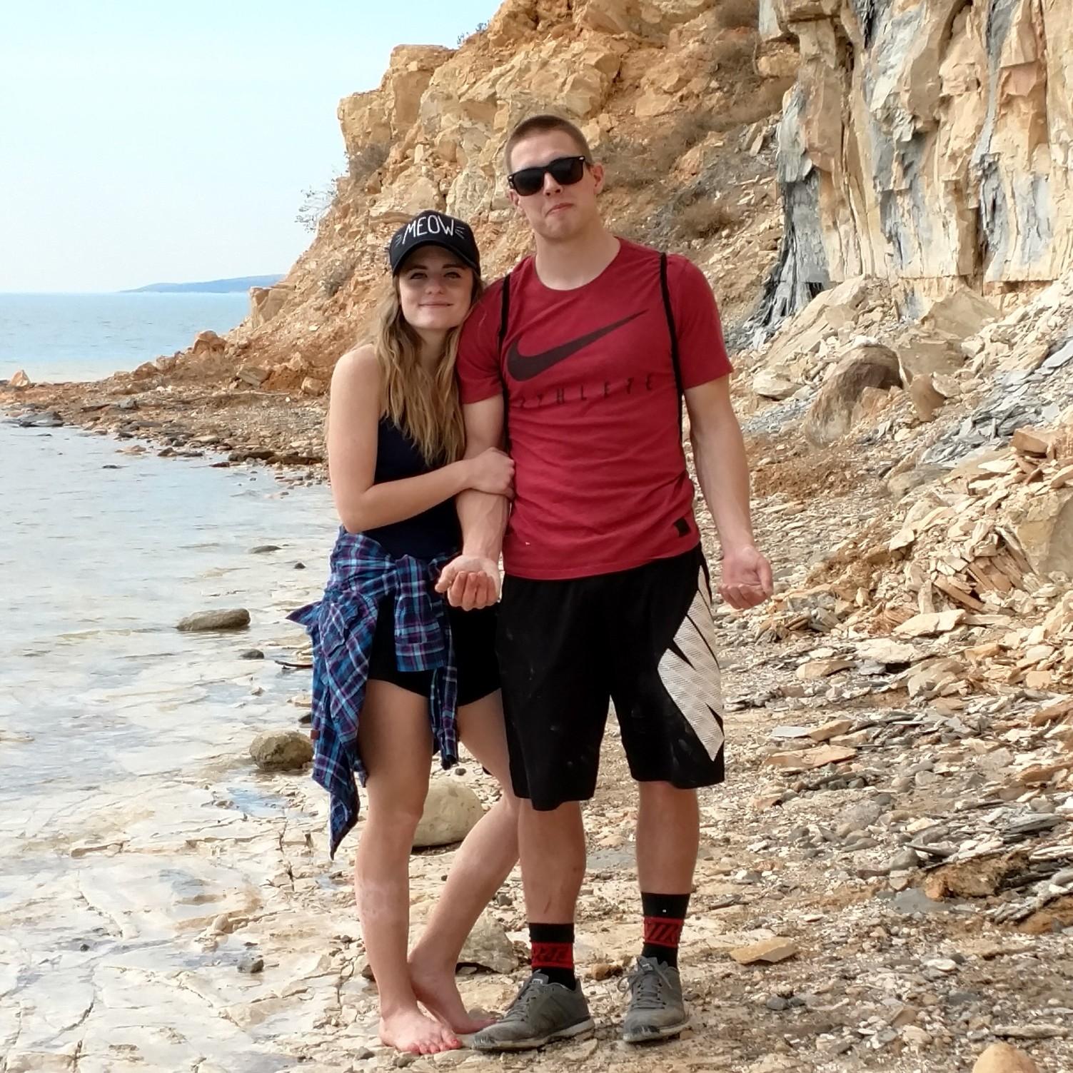 Robert and Cheyenne after we had climbed down a cliff to get close to the river and walk in the water at Yankton.