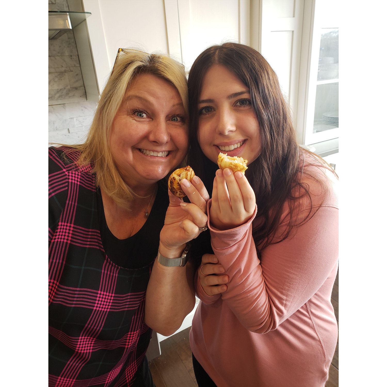 Yes, Anna's mouth is full of æbleskiver in this picture.