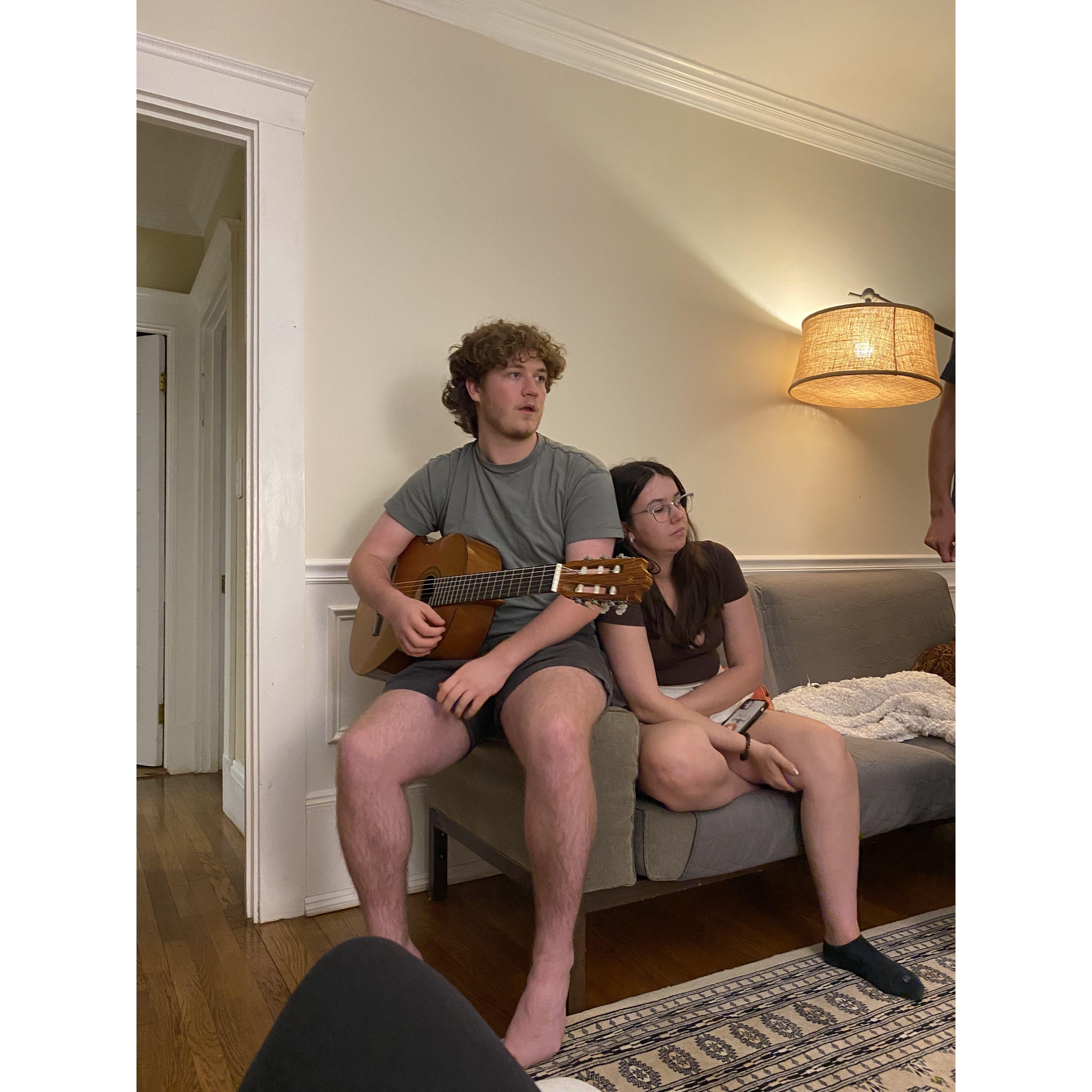 The guitar is only for show, Nat still can't play.