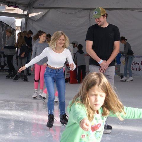 Our first time skating with the family - Travis of course couldn't help showing off