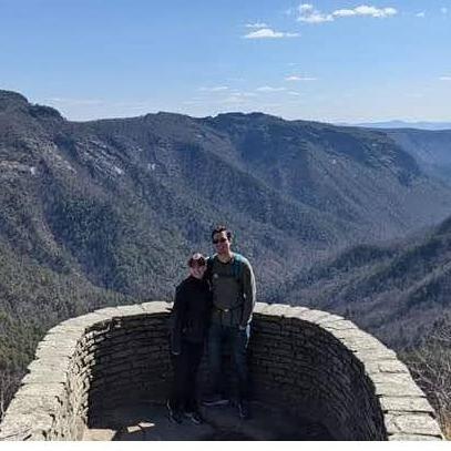 We love the outdoors! This was taken at Wiseman's View Scenic Overlook during our vacation to North Carolina. We got engaged during this vacation!