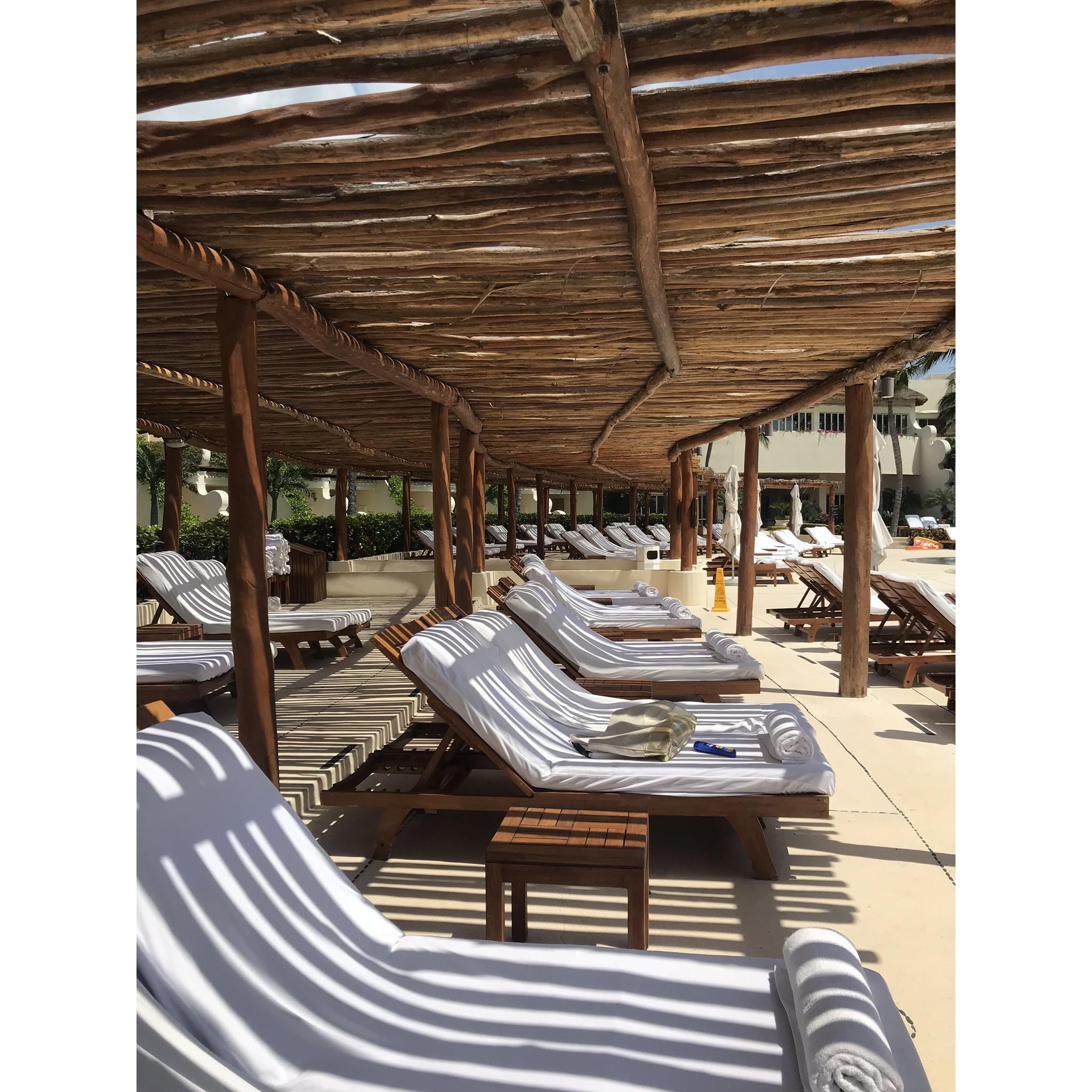 Cabanas by the Ambassador pool. Open to everyone first come, first served.