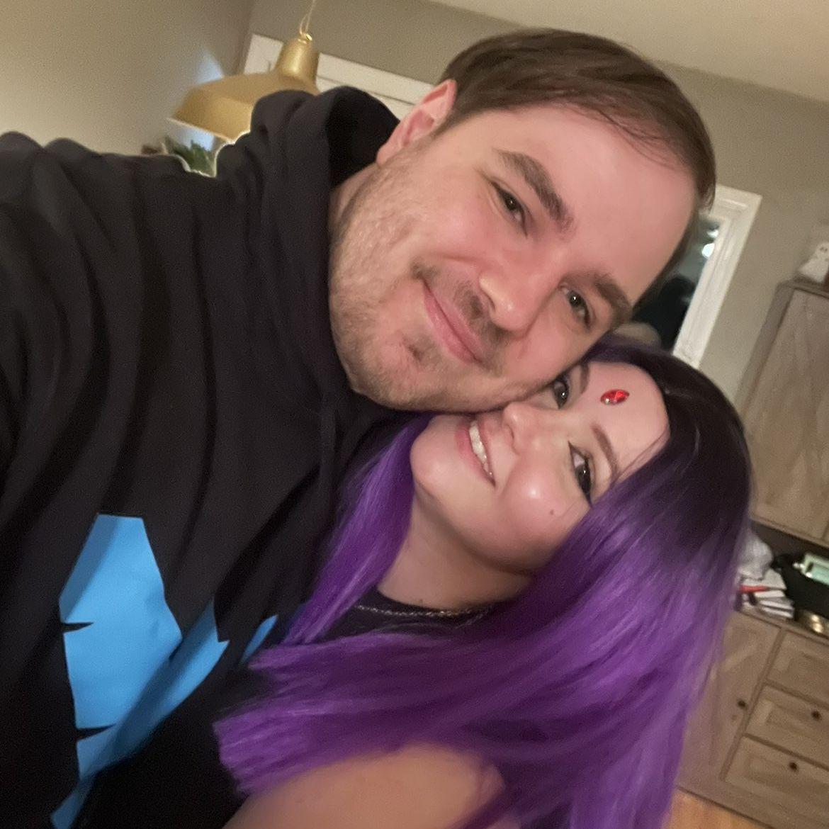 We dressed up as DC characters Nightwing and Raven for Halloween 2025