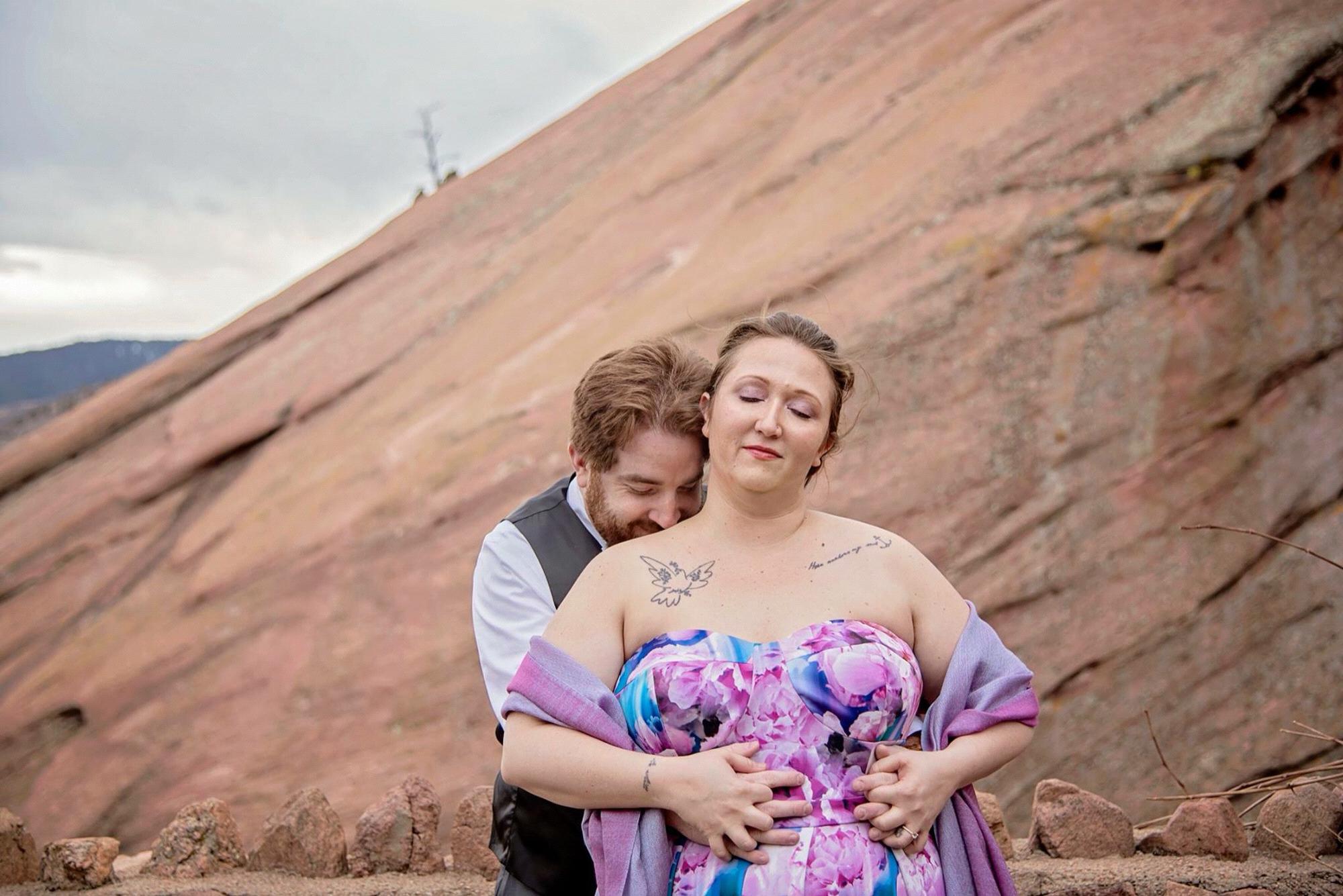 Engagement photos at Red Rocks courtesy of Becca Romine with Feathered Penny Photography