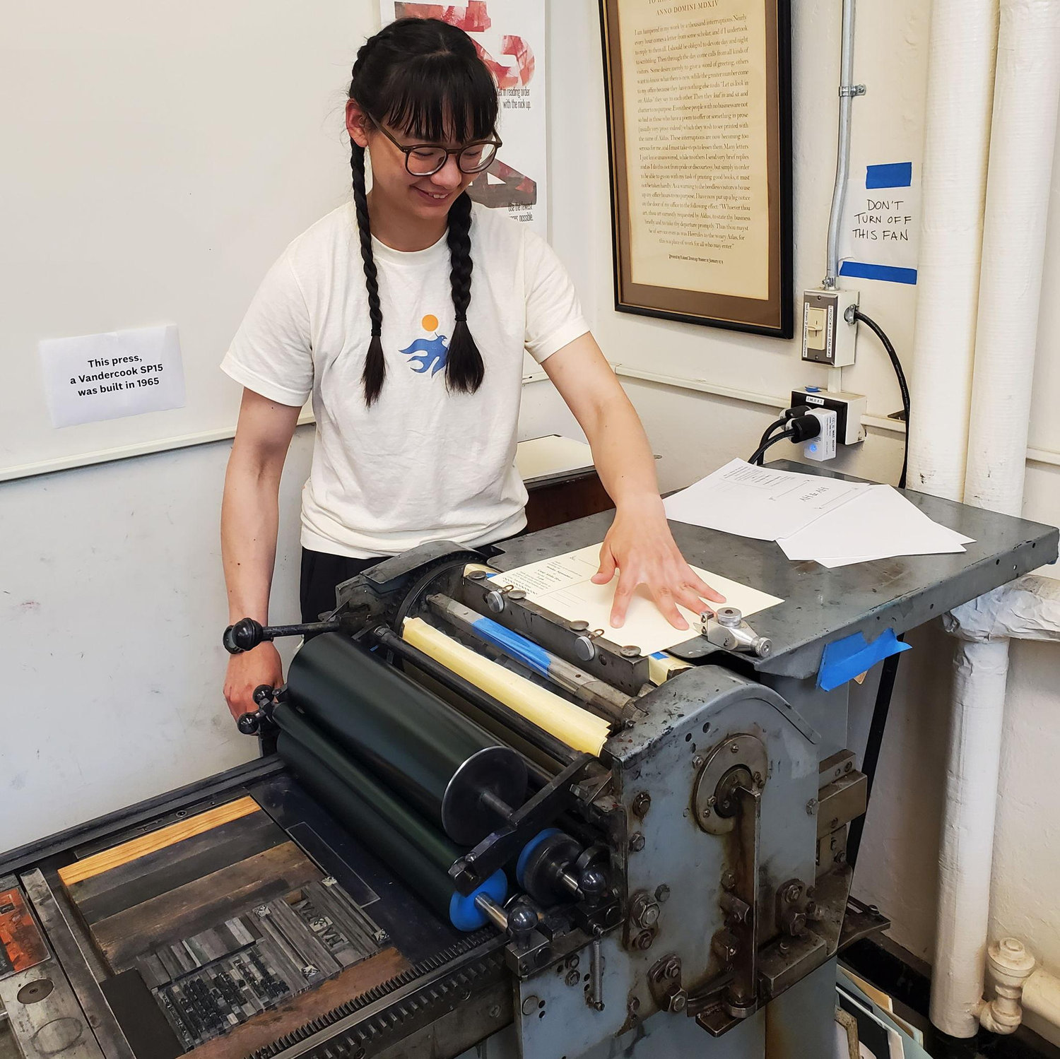 We used the Vandercook proof press in the Dartmouth Letterpress studio to make our invitations.