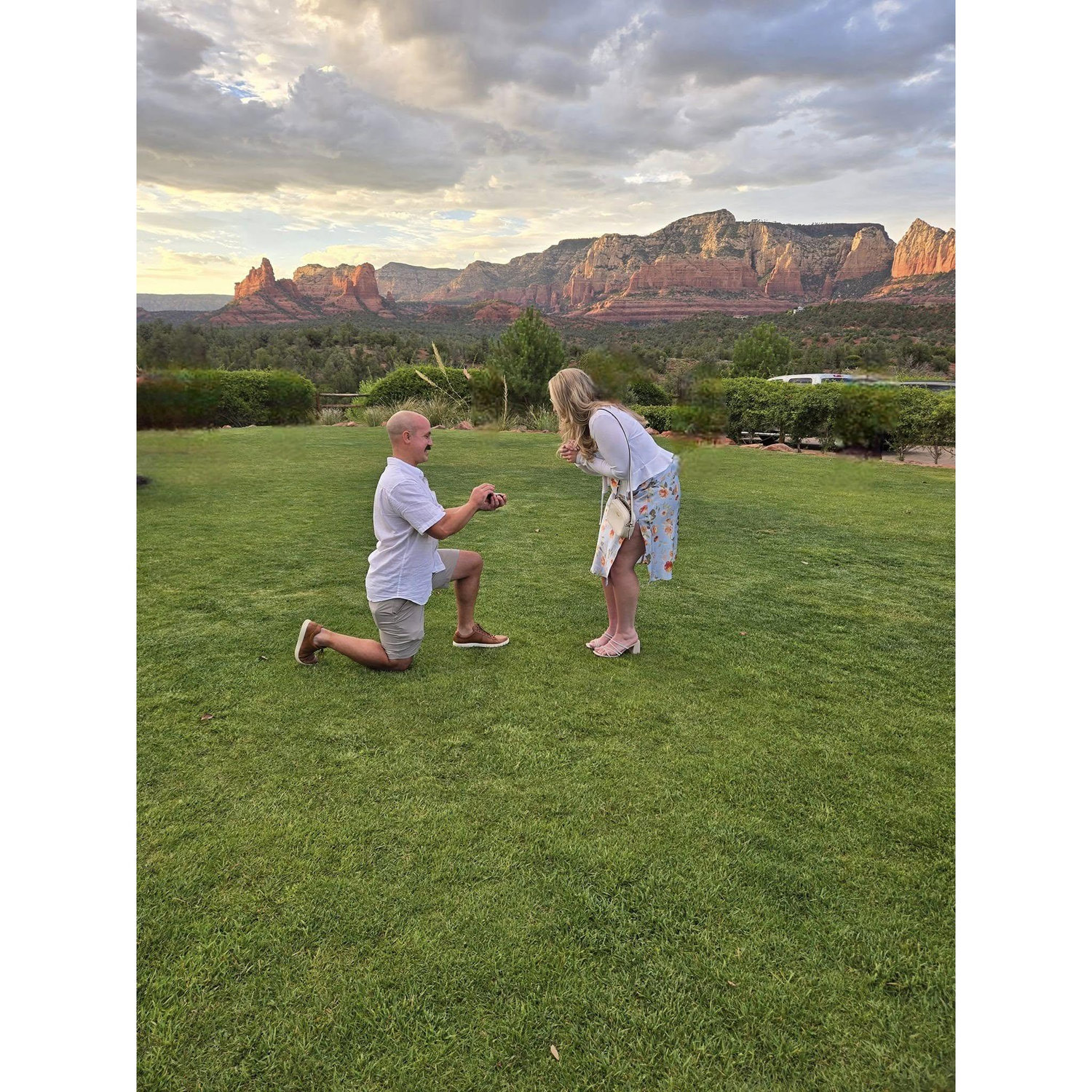 Joe proposing at sunset in Sedona