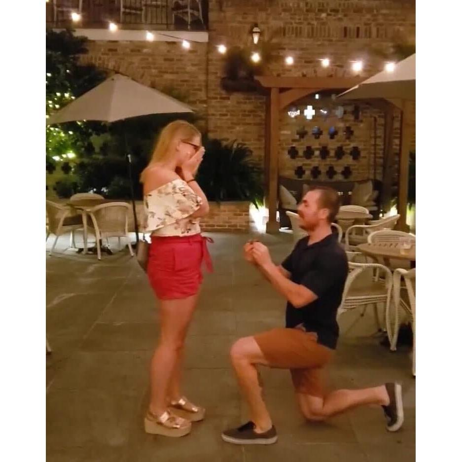 Blurry... but this is a screen shot from the video of Ian popping the question!
