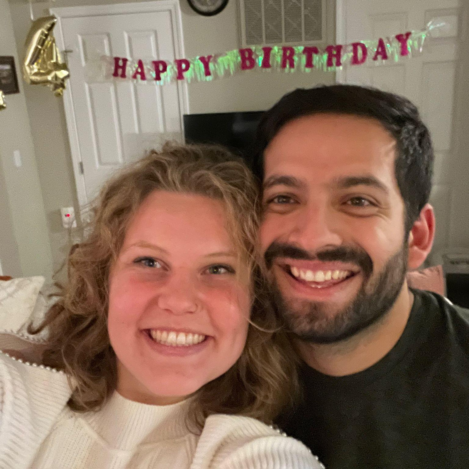 11/17/25: Taking a selfie in front of the 24th birthday decorations Sierra put up for Adriana!