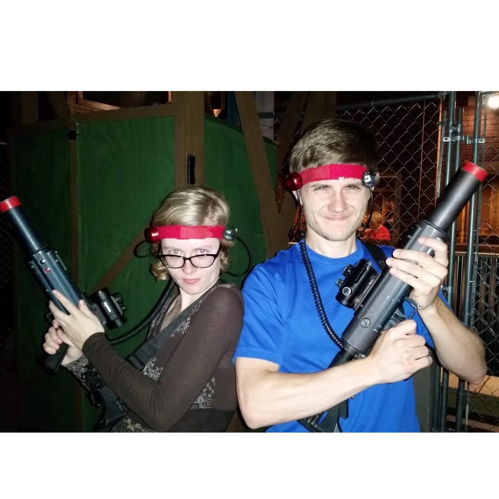 The very first photo of us together was taken while we were playing laser tag with friends.