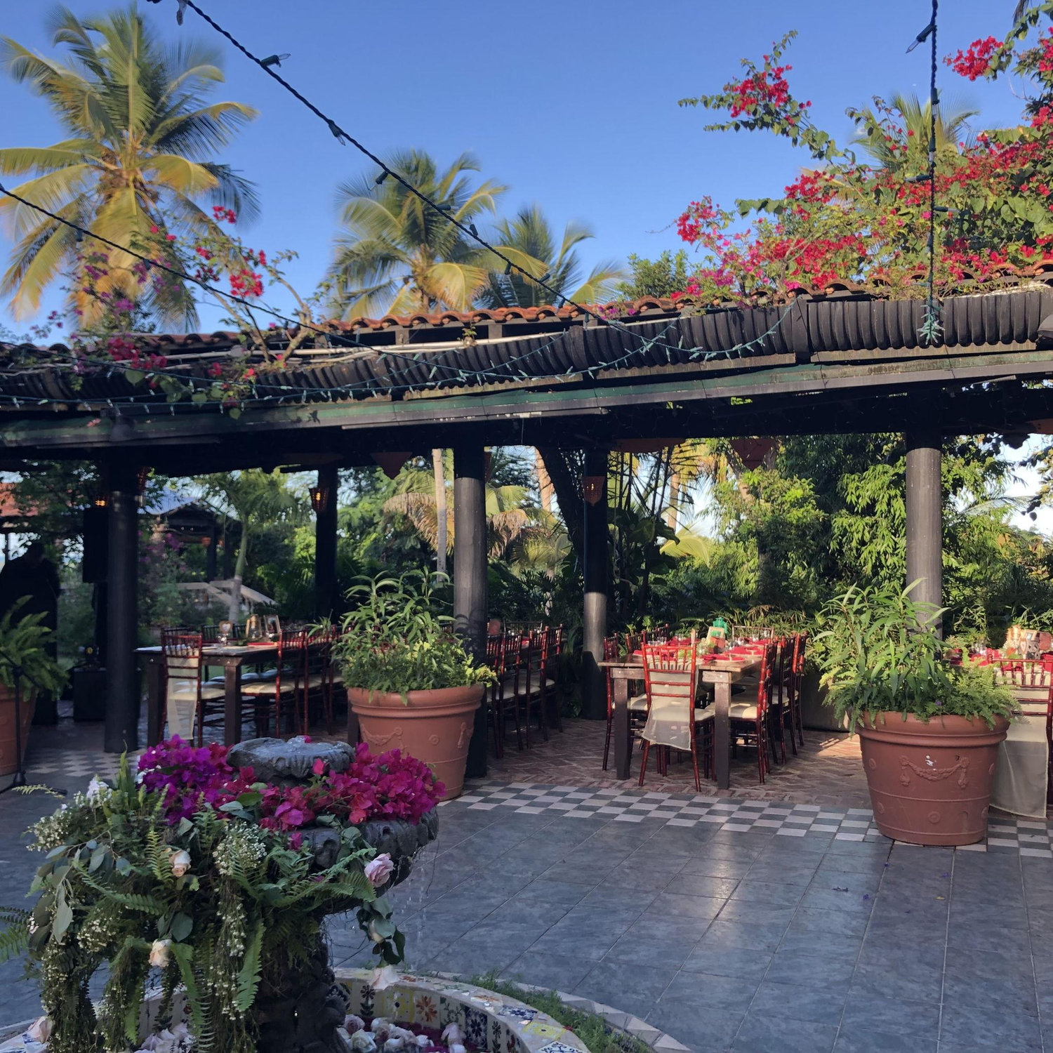 The reception area is open air in the center, but the other areas are covered.