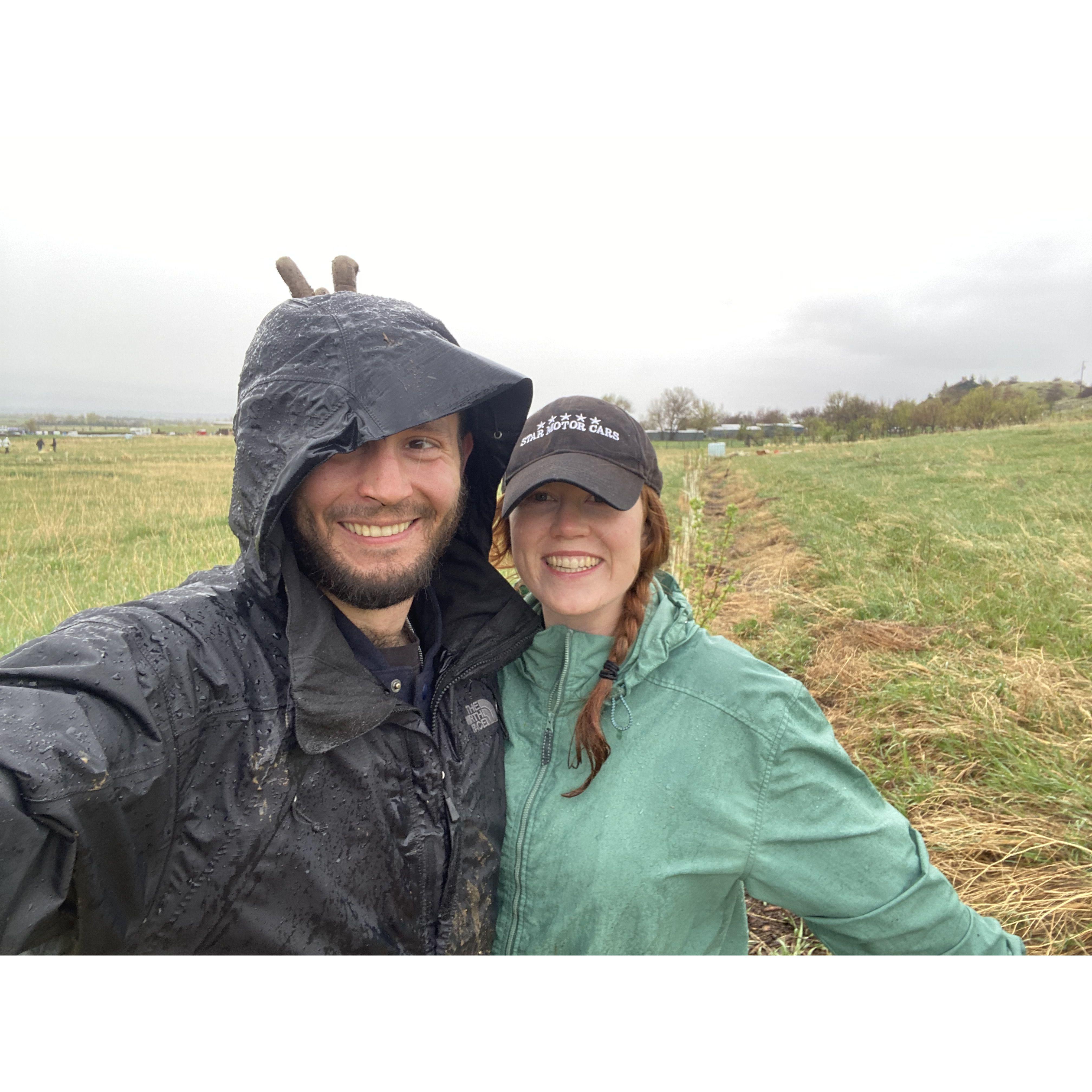 Helping the community plant trees in the rain!
