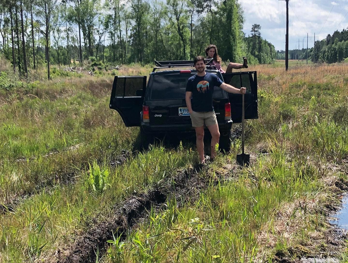 After Blaine got his jeep stuck so far in the mud, Danielle's dad had to pull it out with a tractor.