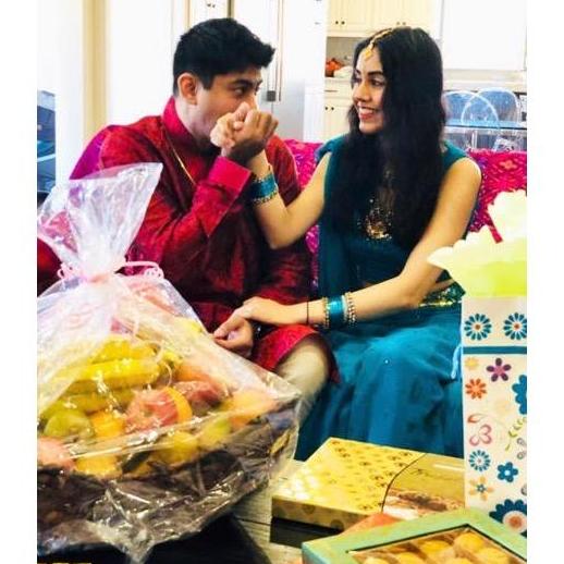 In Tulsa, OK getting our families' blessings. And yes, there were way too many ladoos on that table.