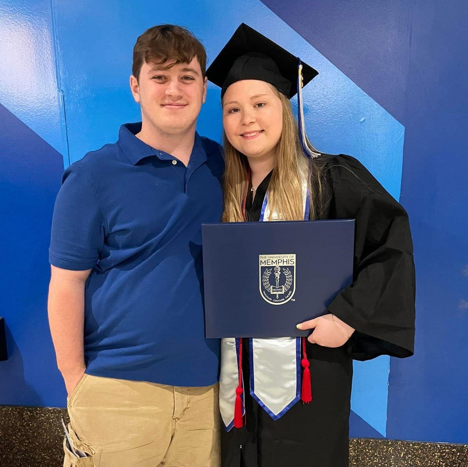 Supporting me at graduation #2, getting my bachelor's degree.