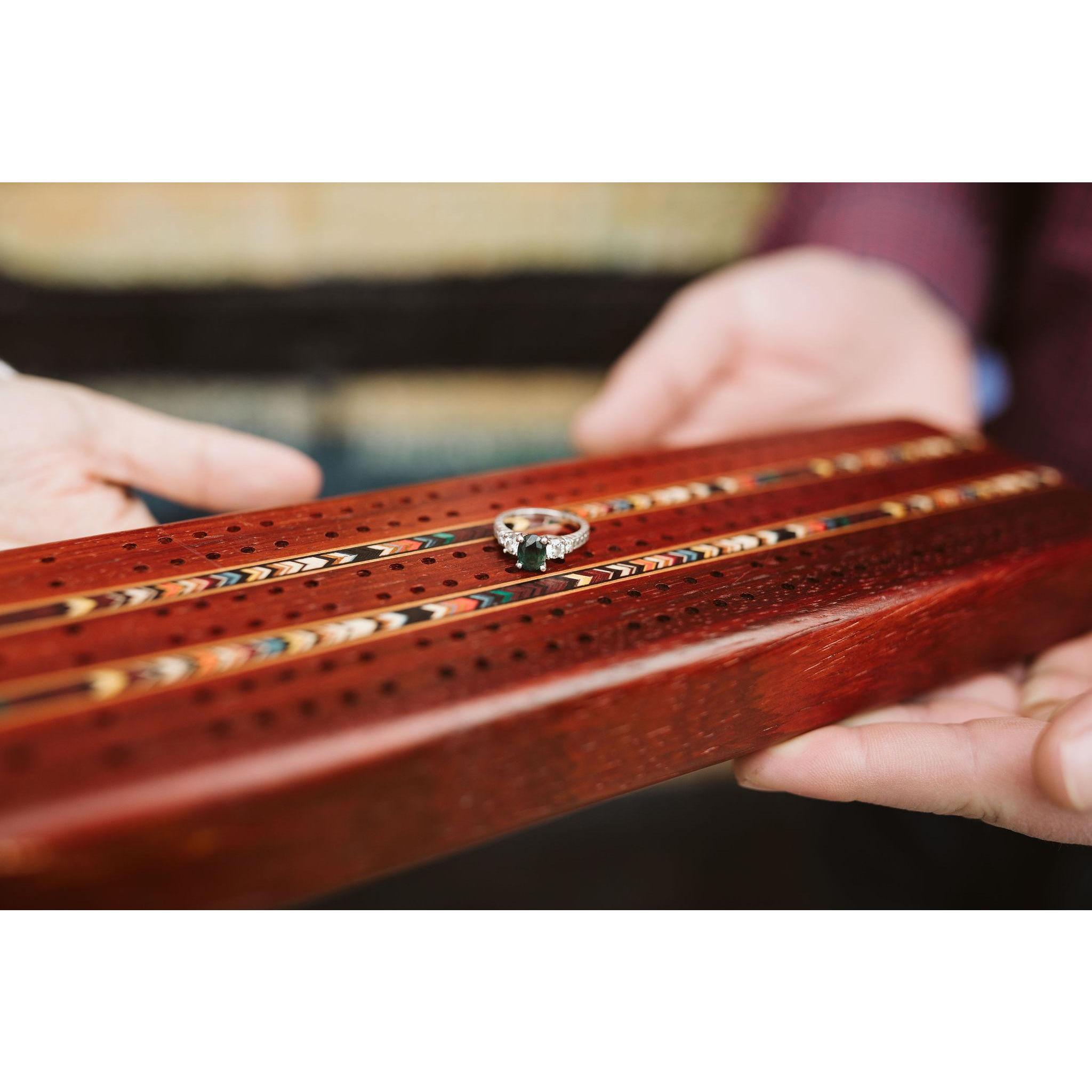 Cribbage board from a trip to Bandon, OR in August 2018. Ring from proposal, July 2019.