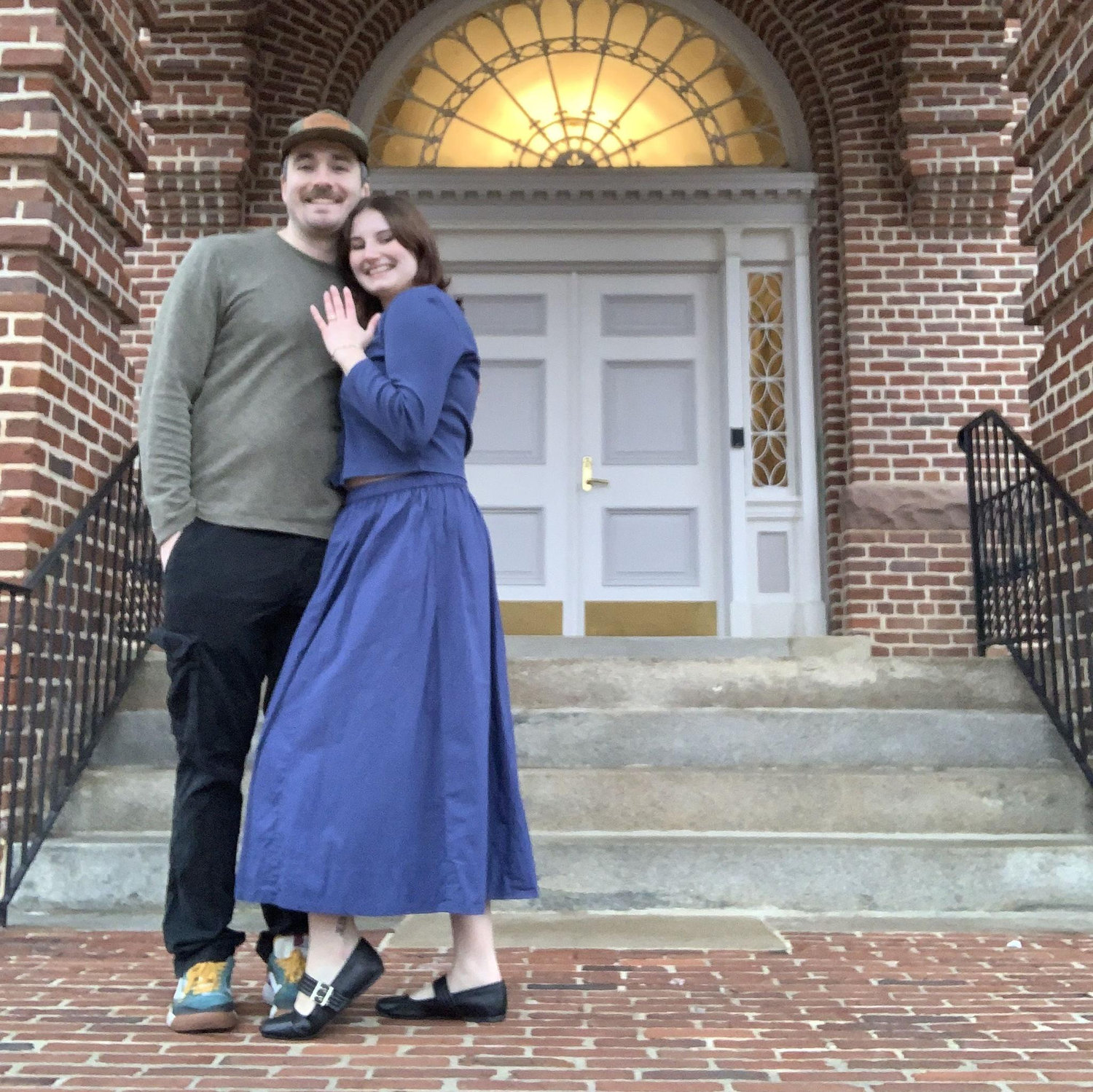 Taken the day we got engaged in front of NC State's Bell Tower!