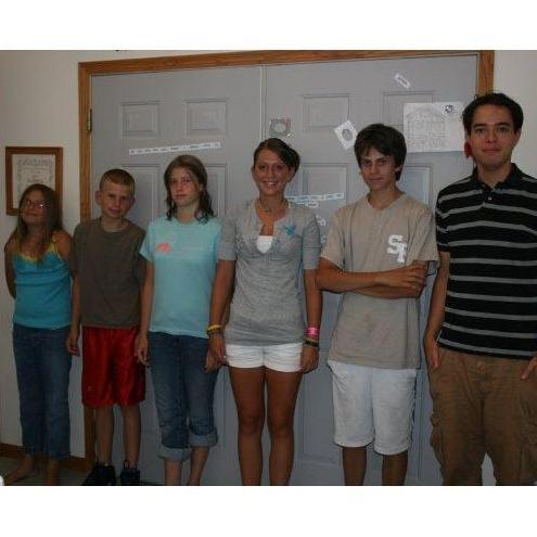 Laura is on the far left, with her sister and cousins.